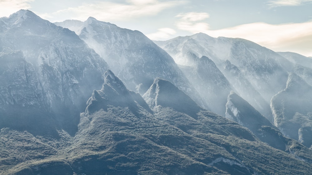 green grass near mountain