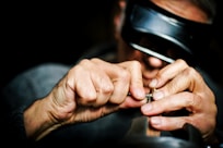 person holding metal tool