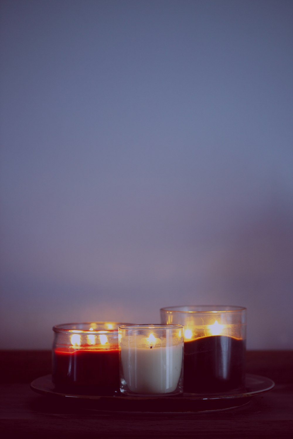 three clear glass cups