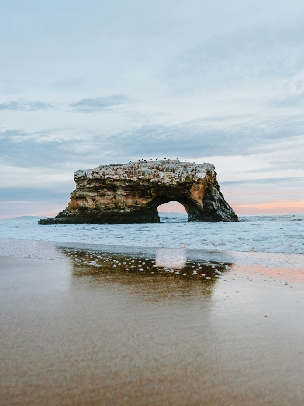 sea stack under the cloudy sky