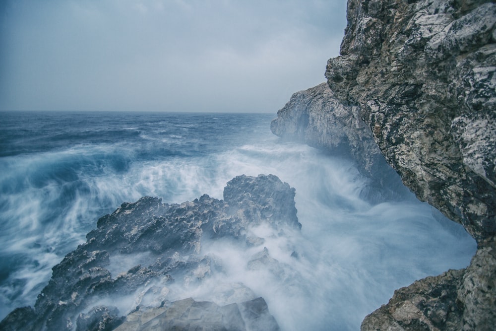 water splashing on rocks