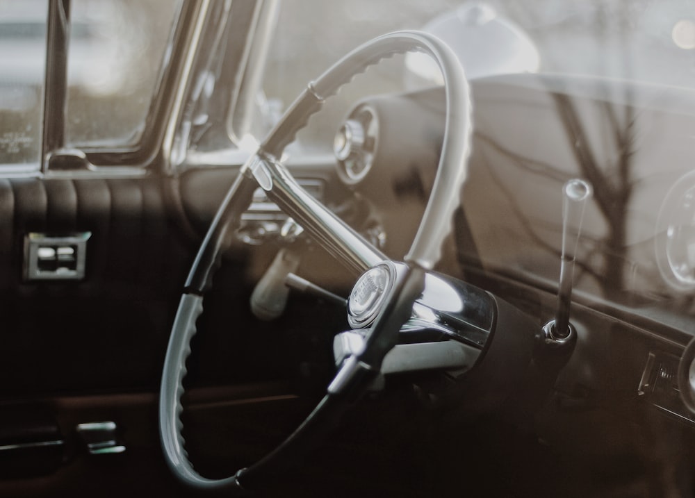 a steering wheel and dashboard of a car