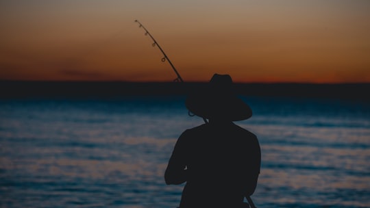 silhouette of person fishing in La Paz Mexico
