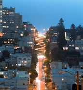Bright LED lights illuminating a modern African neighborhood at dusk.