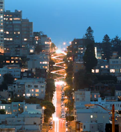 Evening shot of Avenida Waldir Pires illuminated by modern LED streetlights with smooth traffic flow.