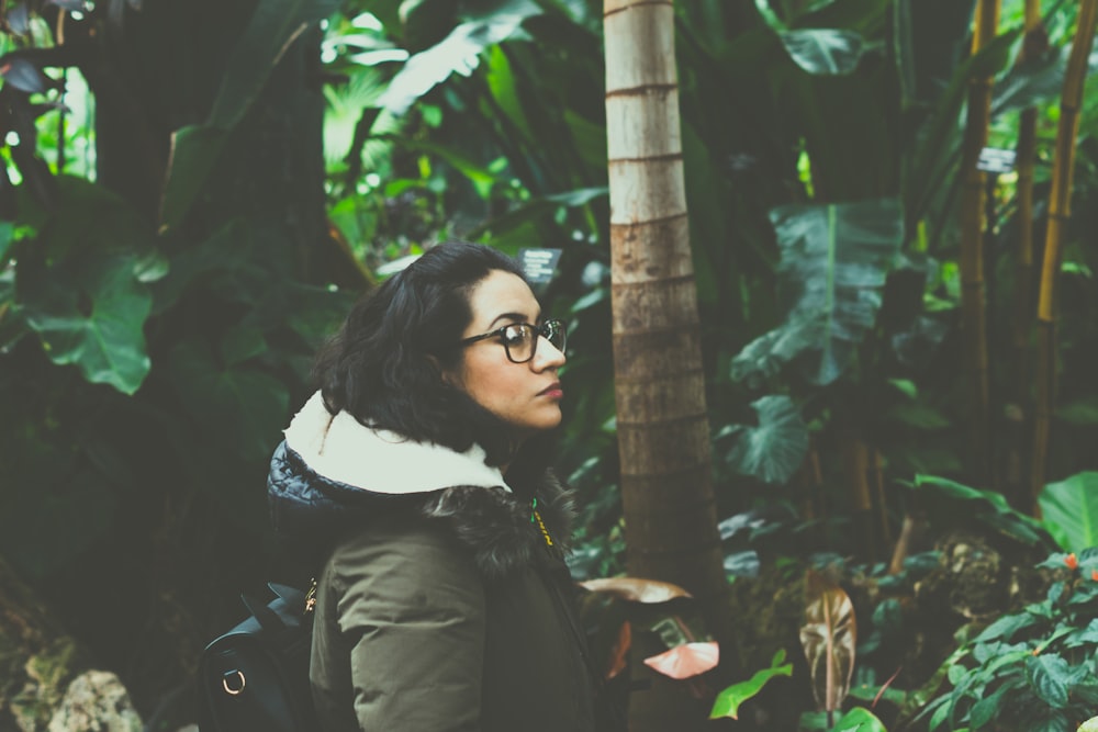 woman standing near tree