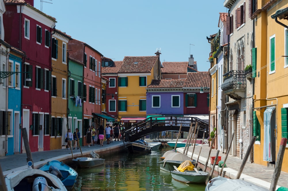 body of water surrounded by multicolored concrete structures