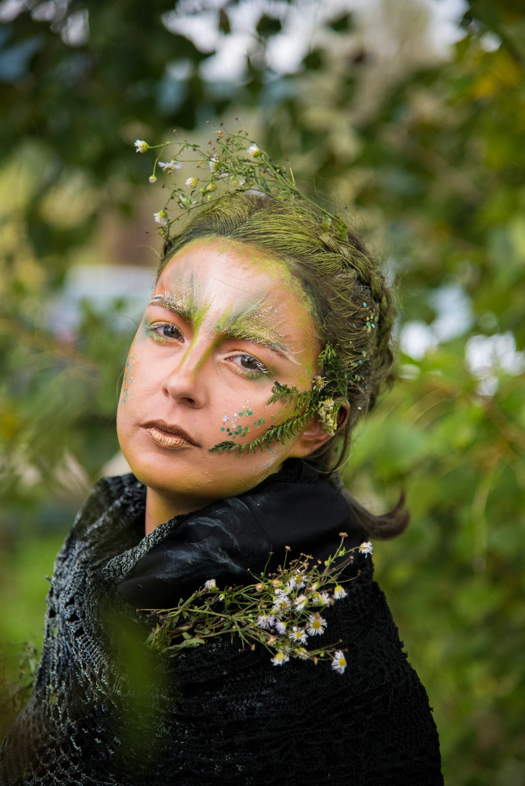 selective focus photo of woman with nature-themed makeup