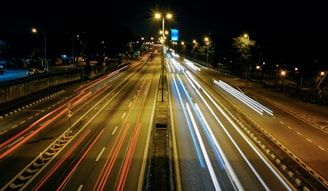 time lapse photo of cars on road