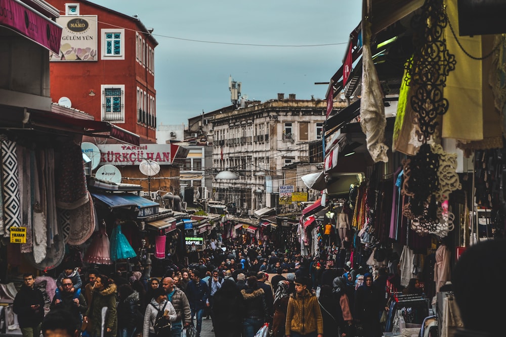 people in street under blue sky during daytime