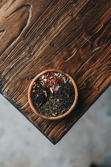 herbs filled brown bowl