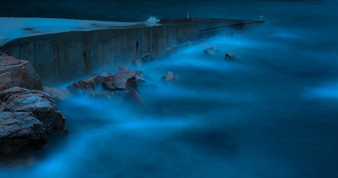 aerial view of body of water, Nighttime by the sea