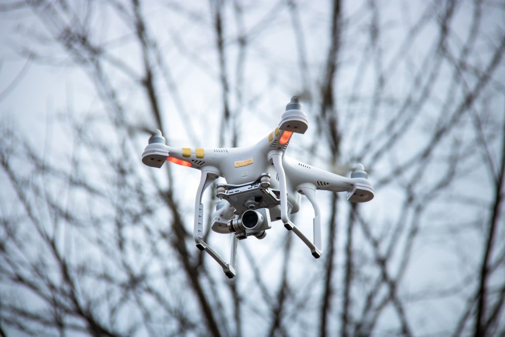 shallow focus photography of quadcopter drone