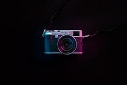 black and silver SLR camera