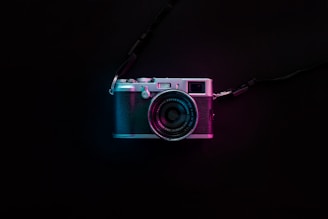 black and silver SLR camera