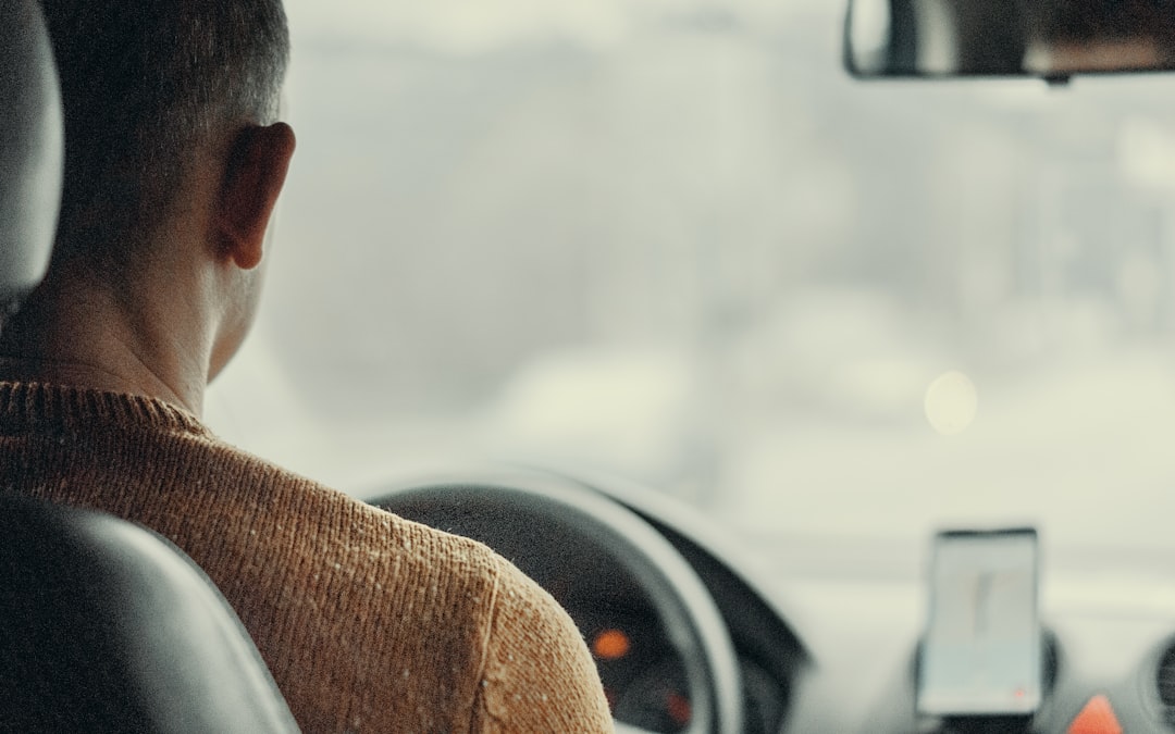 man driving vehicle, The Uber Driver