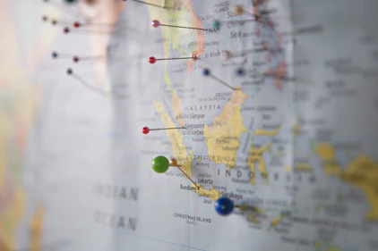 A map highlighting Singapore and Malaysia with connecting lines to China.