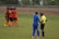 A group of boys celebrating after a football match.