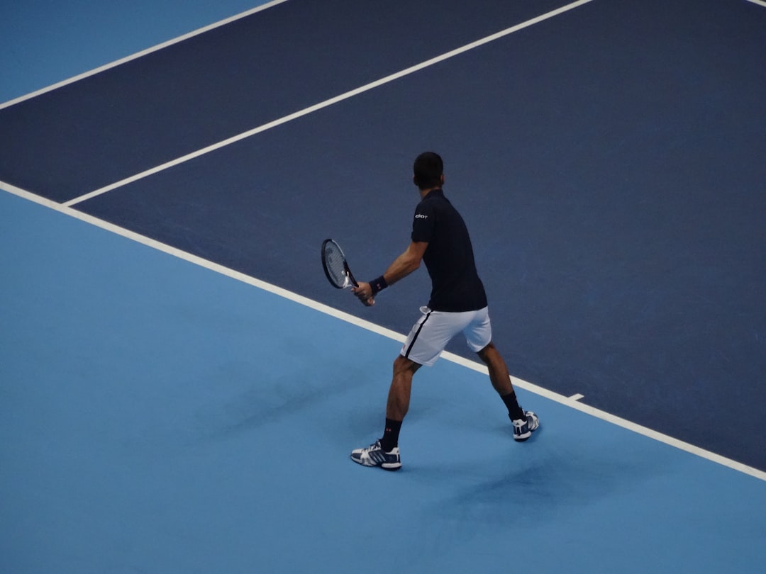 man playing tennis, A joker in London