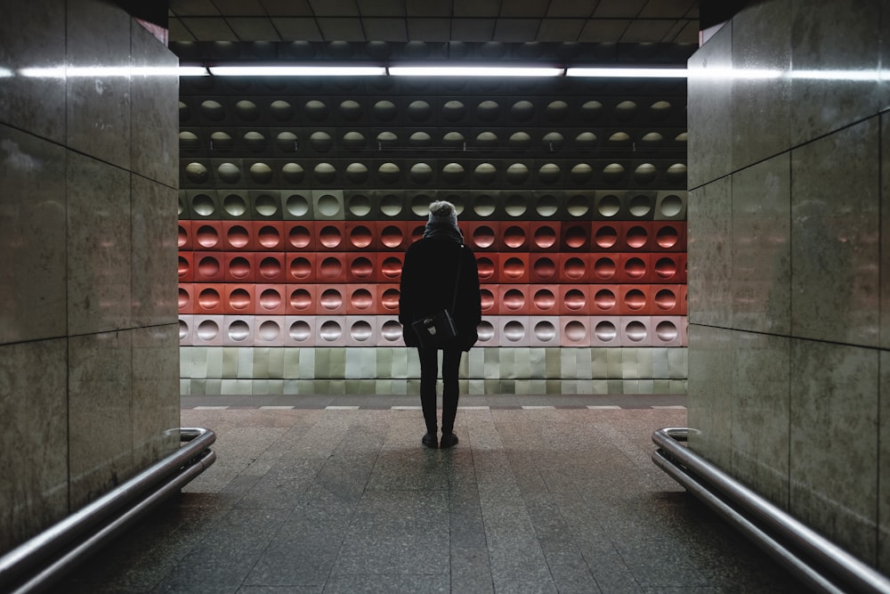 person standing on train station