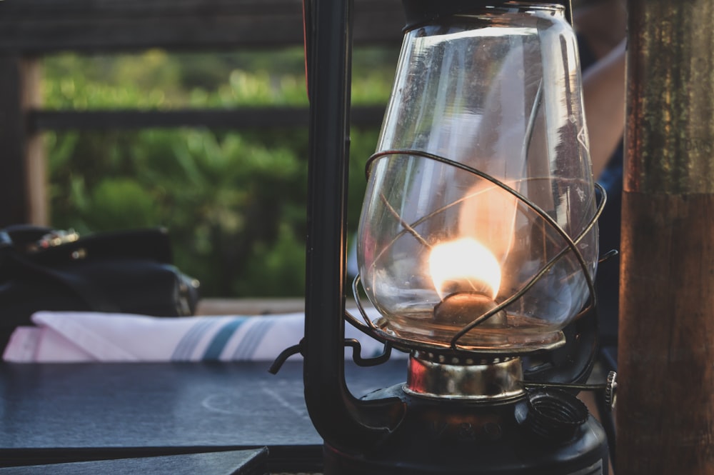 closeup photo of lighted tubular lantern