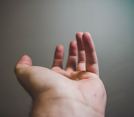 focus photography of person's open hand by NeONBRAND (https://unsplash.com/@neonbrand)