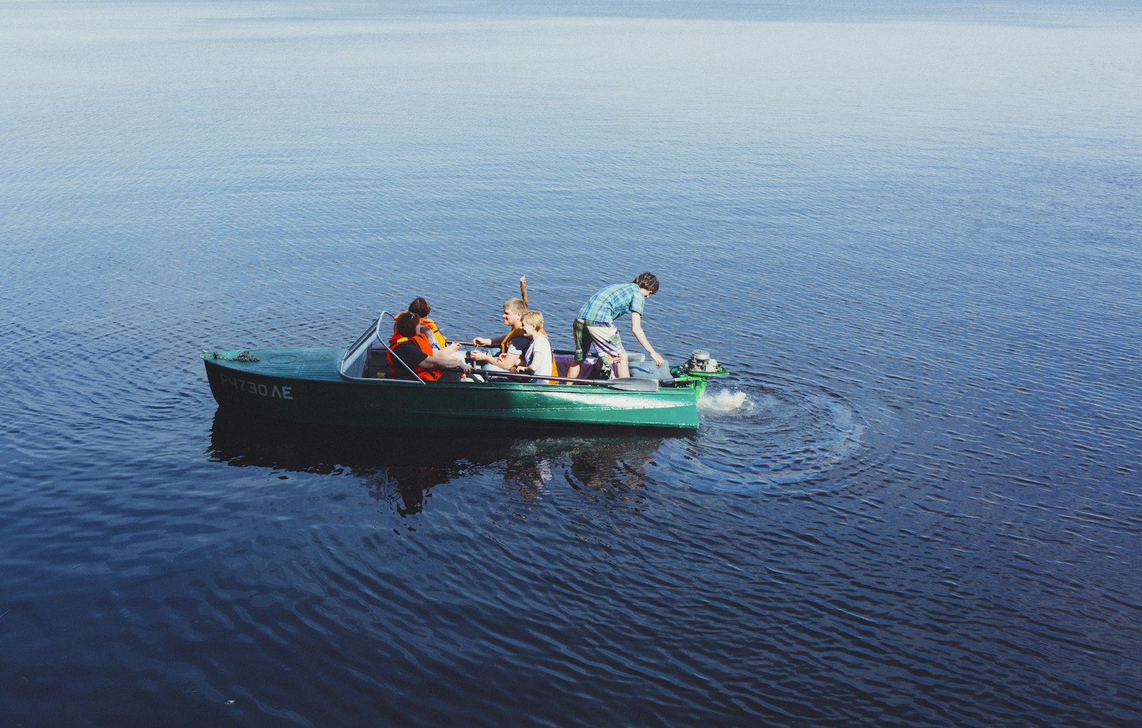 Canon EOS 5D Mark III + Canon EF 35mm F2 IS USM sample photo. People riding power boat photography