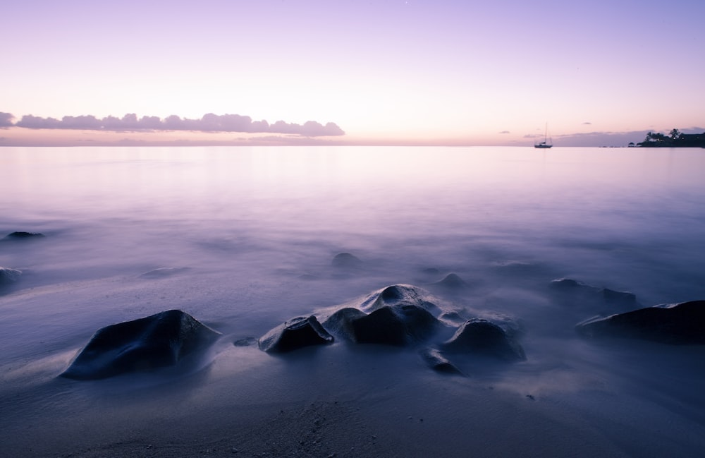 time lapse photography of body of water