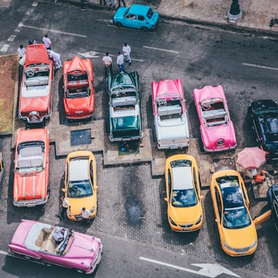 assorted cars parked during daytime