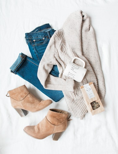 gray cardigan, blue jeans, and pair of brown chunky heeled shoes