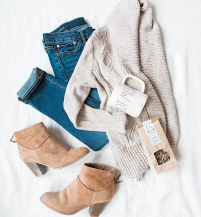 gray cardigan, blue jeans, and pair of brown chunky heeled shoes