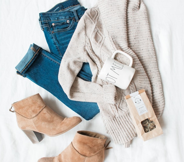 gray cardigan, blue jeans, and pair of brown chunky heeled shoes