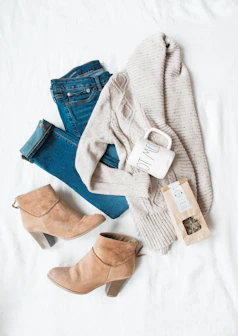 gray cardigan, blue jeans, and pair of brown chunky heeled shoes