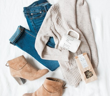 gray cardigan, blue jeans, and pair of brown chunky heeled shoes