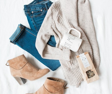 gray cardigan, blue jeans, and pair of brown chunky heeled shoes