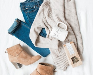 gray cardigan, blue jeans, and pair of brown chunky heeled shoes