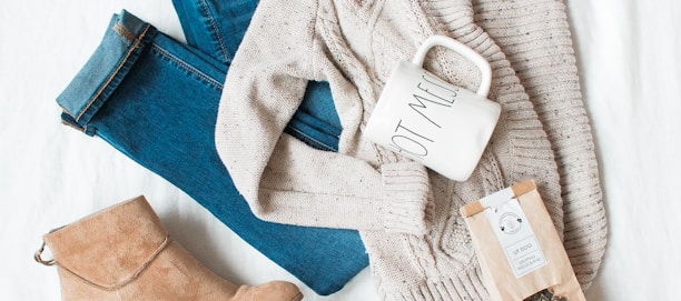 gray cardigan, blue jeans, and pair of brown chunky heeled shoes