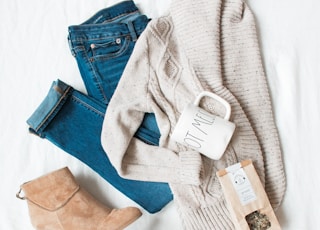 gray cardigan, blue jeans, and pair of brown chunky heeled shoes