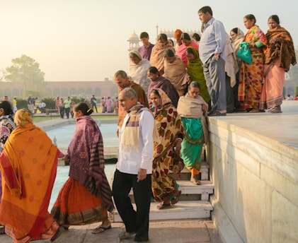 people standing near swimming pool