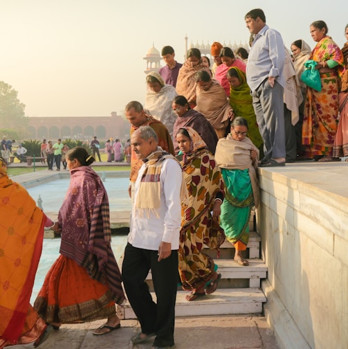 people standing near swimming pool