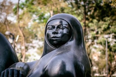 An elegant 3D printed sculpture displayed in a serene setting.