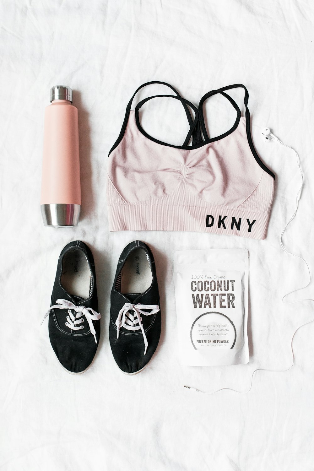 pair of black lace-up shoes near DKNY sport bra