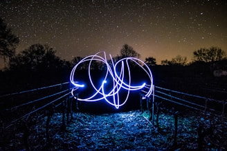 long exposure photo of purple LED light