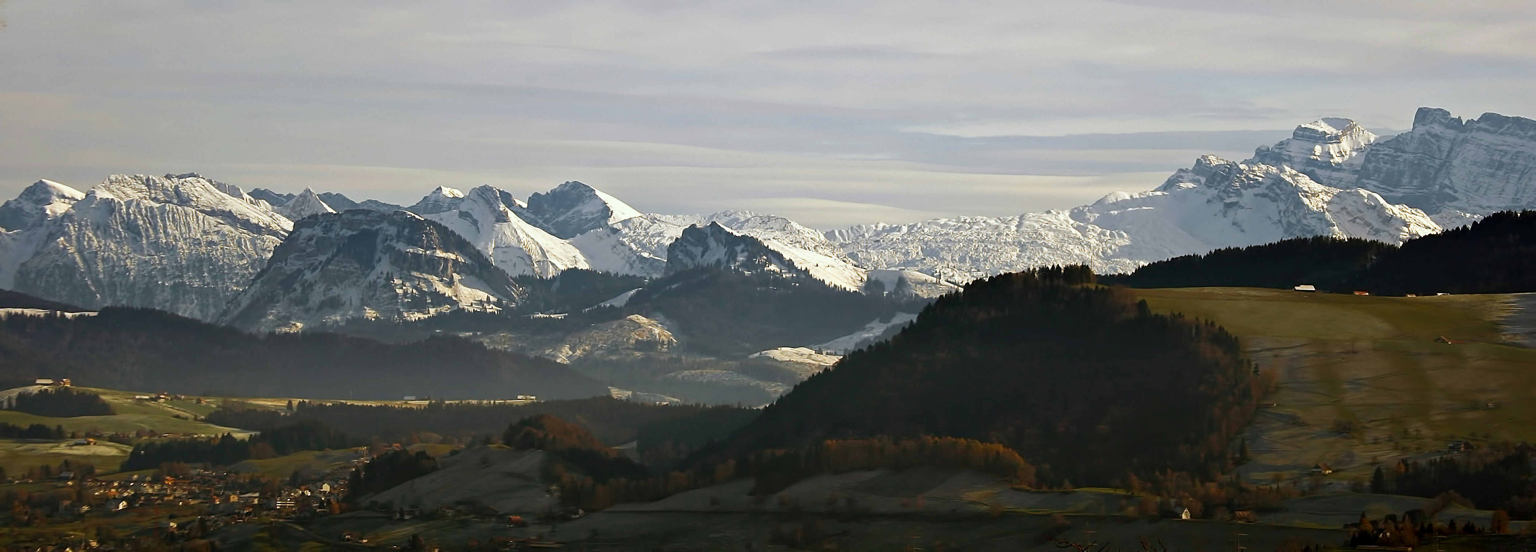 snow-covered mountains under gray clouds during daytime, Winter panorama