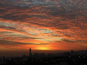 An inspiring shot of a city skyline at sunset, representing growth and opportunity.