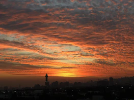 An inspiring shot of a city skyline at sunset, representing growth and opportunity.