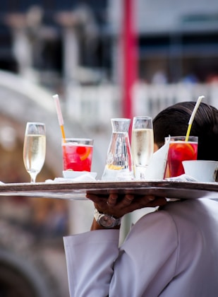 waiter serving beverages