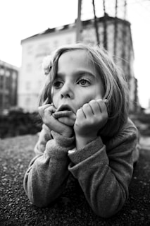 grayscale photo of girl doing face palm