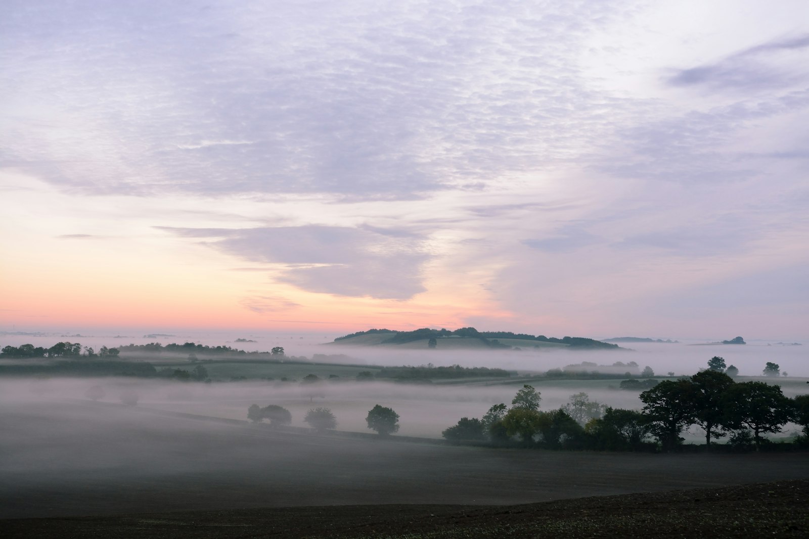 Nikon D7100 + Sigma 18-35mm F1.8 DC HSM Art sample photo. Mountain covered by fog photography