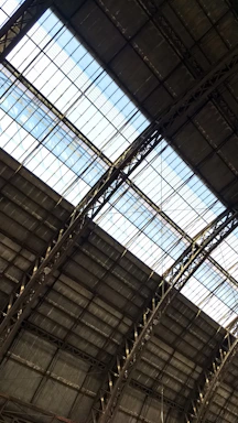 High-quality photo of a polished concrete industrial floor inside a modern warehouse with natural light.